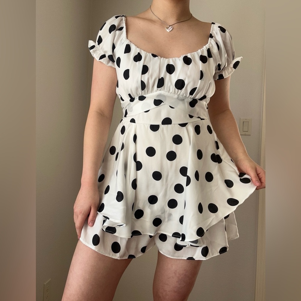 White and black polka dot romper with tie back detail #polkadot #romper